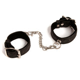 Restrain your lover with the Bettie Page Wild 'n' Willing Wrist Cuffs. These luxurious faux leather handcuffs are finished to perfection with opulent padding, velvet lining and metal trimmings for comfortable and effective restraint.